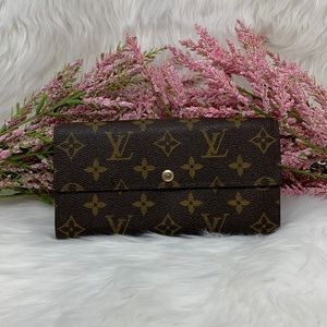 095 Authentic Louis Vuitton Monogram Sarah Wallet Datecode: TR3102